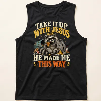 Vintage illustration of a raccoon with text: Take It Up With Jesus He Made Me This Way — printed on a tank top