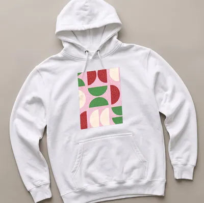 Modern geometric design with textured semicircle shapes in shades of pink and green — printed on a unisex hoodie