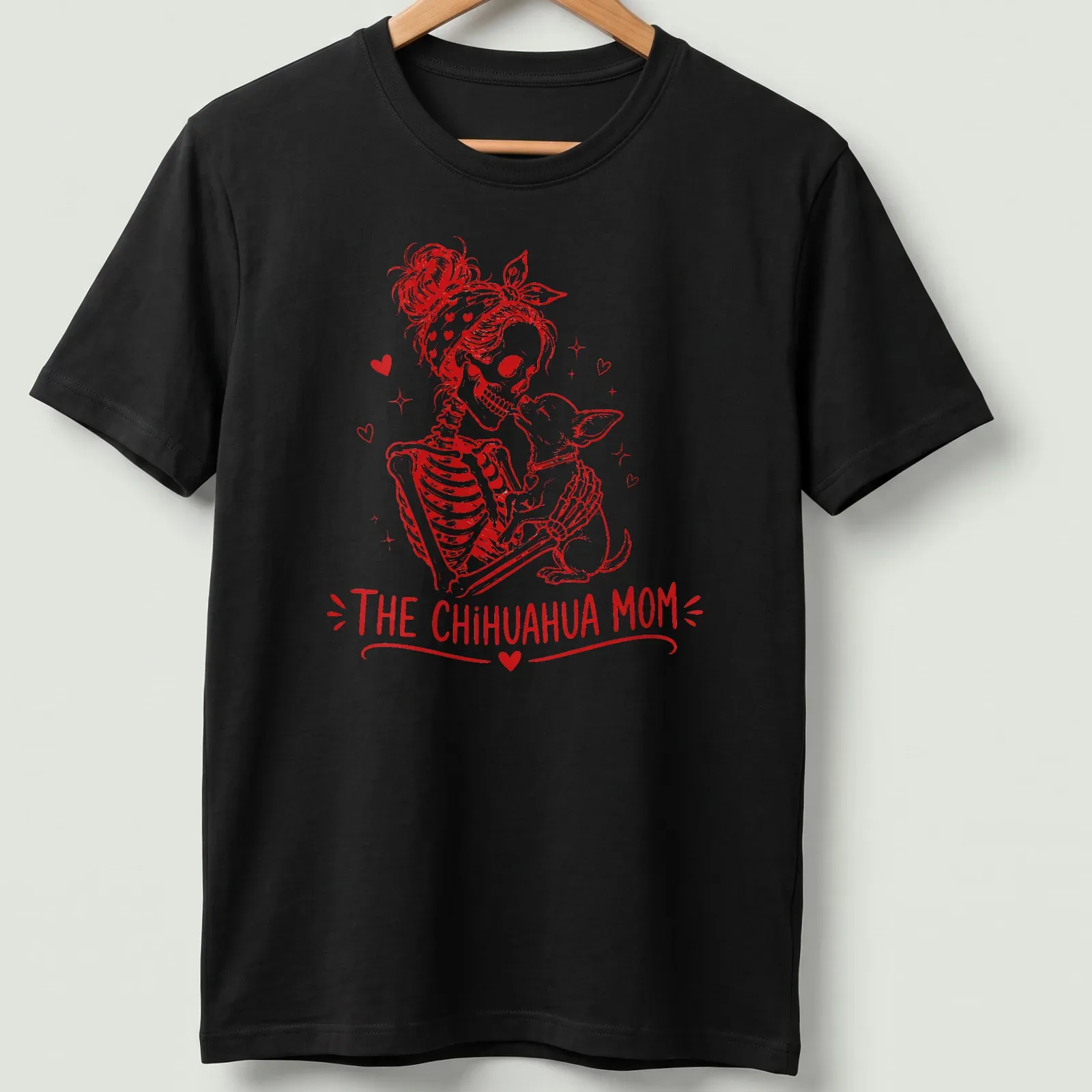 Vintage illustration of a skeleton woman with her Chihuahua, featuring bold lettering above — printed on a unisex t-shirt