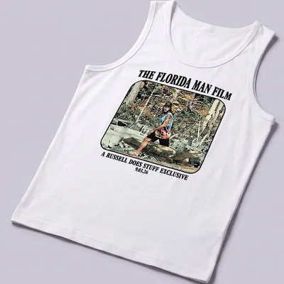 Cartoon graphic of a Florida man wrestling an alligator with colorful text — printed on a tank top