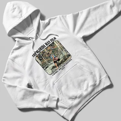 Cartoon graphic of a Florida man wrestling an alligator with colorful text — printed on a unisex hoodie