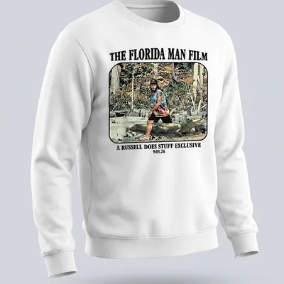 Cartoon graphic of a Florida man wrestling an alligator with colorful text — printed on a unisex sweatshirt