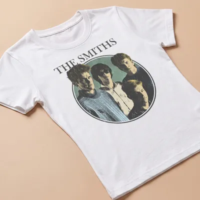 Retro portrait of The Smiths band members in blue, black, white, and green — printed on a women's shirt