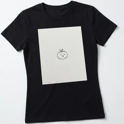 Line-art drawing of a tiny pumpkin on a white — printed on a women's shirt
