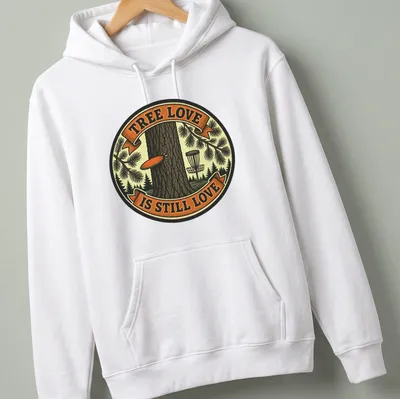 Vintage badge graphic featuring a tree and the text 'Tree Love Is Still Love' in brown, green, orange, and cream — printed on a unisex hoodie
