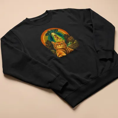 Retro print of an orange tabby cat taking a selfie with alien motifs — printed on a unisex sweatshirt