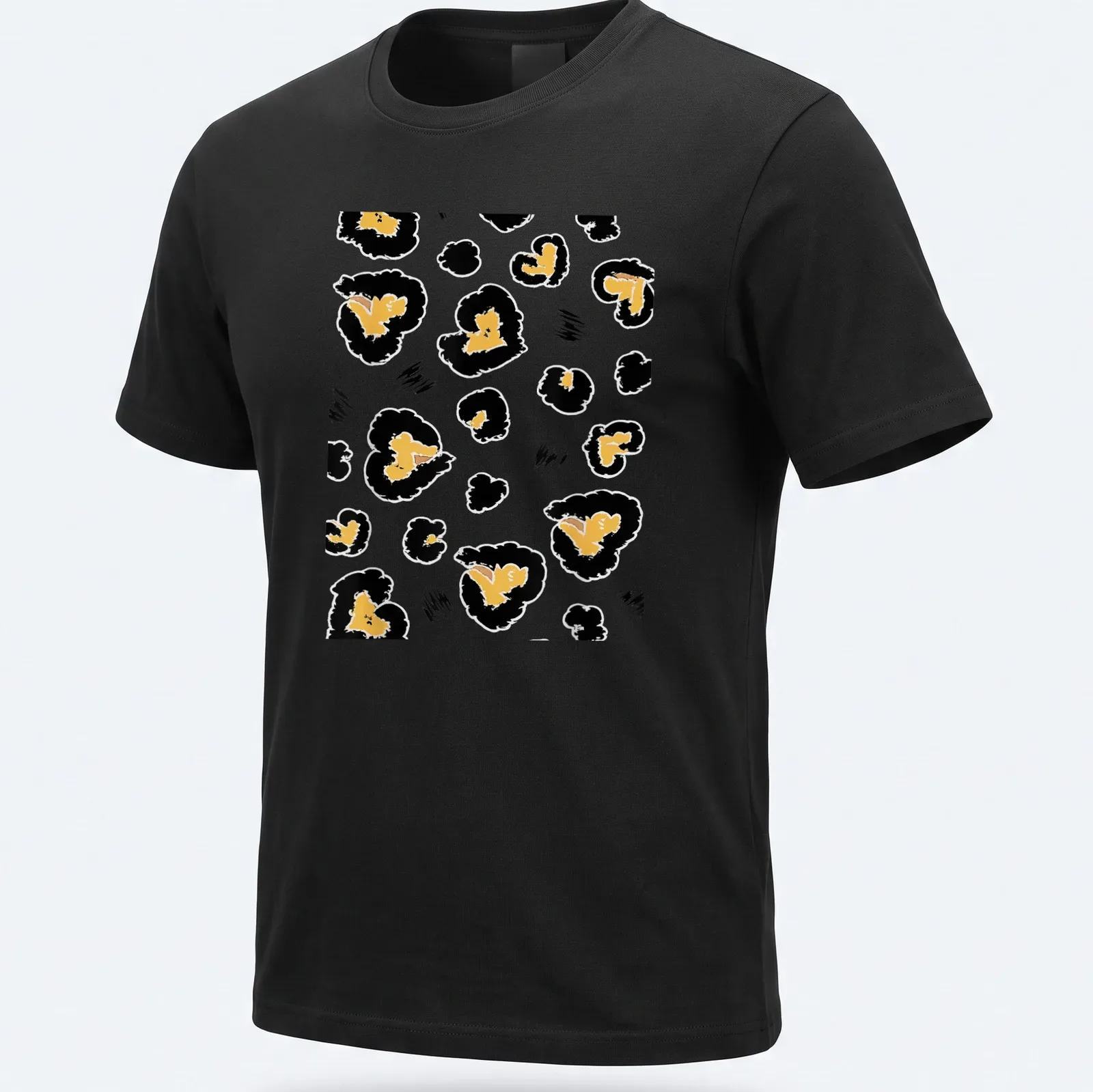 Abstract leopard heart spots in gold, black, and white on a T-shirt. — printed on a unisex t-shirt