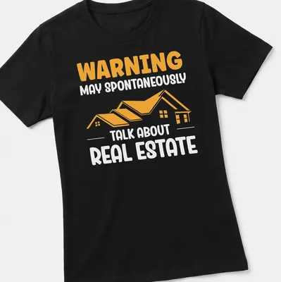 Bold typography t-shirt with a house graphic and humorous text about real estate — printed on a women's shirt
