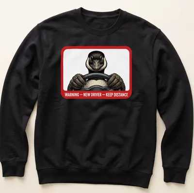 Illustrated goose driving a car with a warning message about distance. — printed on a unisex sweatshirt