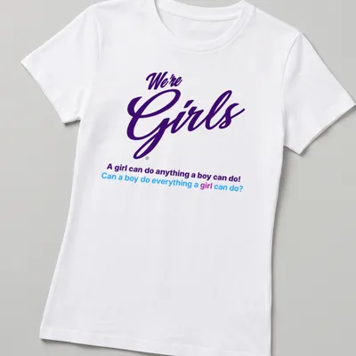Colorful typography slogan about gender equality with purple and blue text — printed on a women's shirt