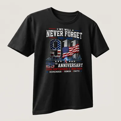 Patriotic graphic T-shirt featuring 9/11 memorial and American flag colors — printed on a unisex t-shirt (angled view)