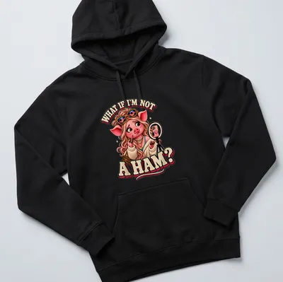 Cartoon pig character with the text 'What If I'm Not A Ham?' in playful colors. — printed on a unisex hoodie