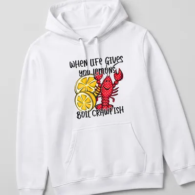 Playful cartoon shirt featuring red crawfish and lemons with humorous text — printed on a unisex hoodie