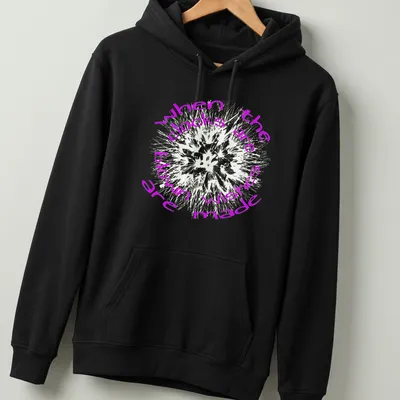 Text art shirt featuring dandelions and the phrase when the clocks are blown wishes made in purple and white — printed on a unisex hoodie