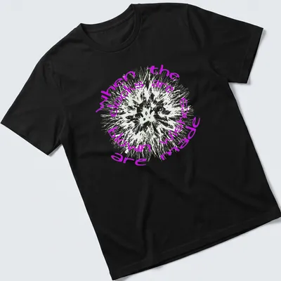 Text art shirt featuring dandelions and the phrase when the clocks are blown wishes made in purple and white