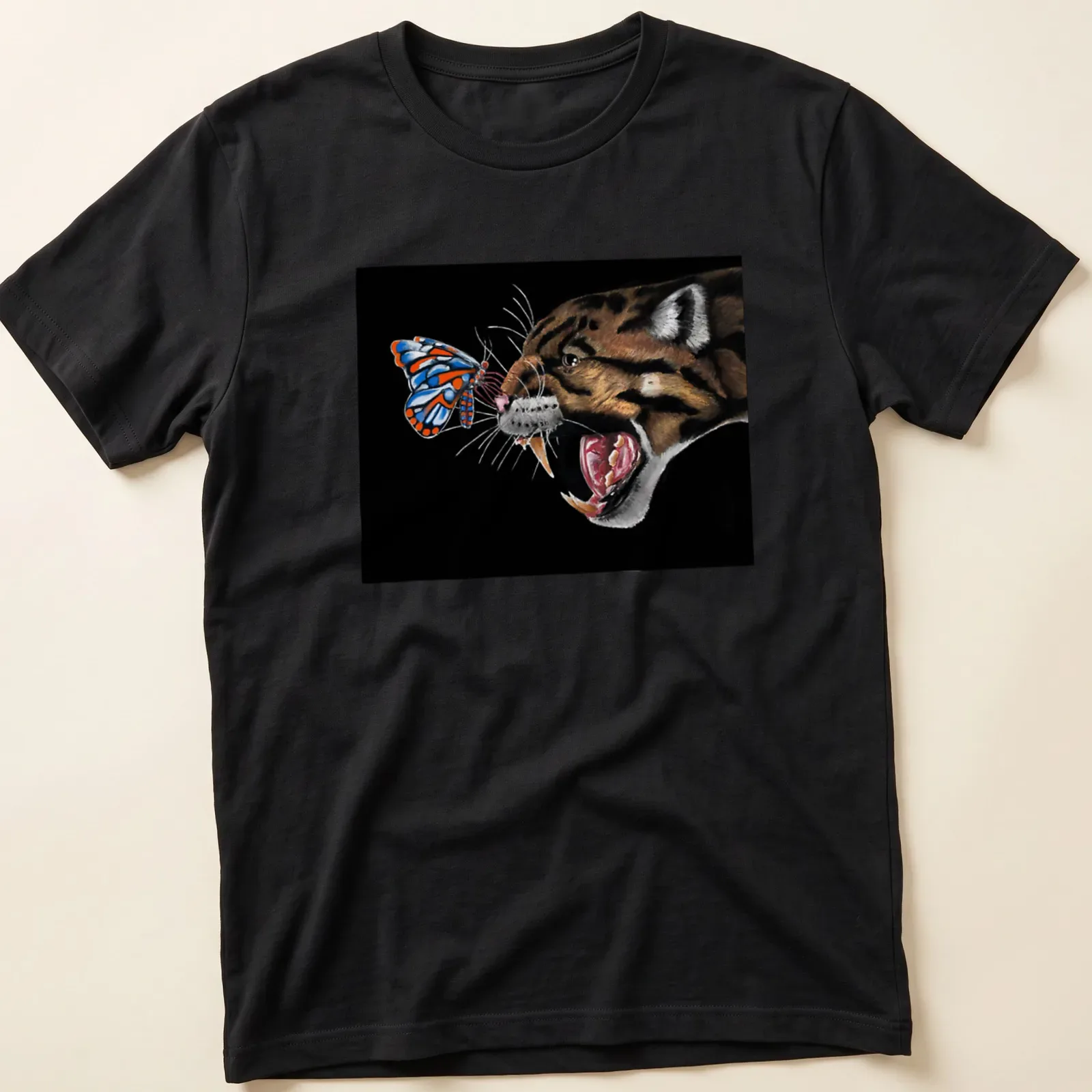 Realistic print of a clouded leopard and butterfly with the text 'Why Can’t We Be Friends' — printed on a unisex t-shirt