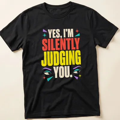 Colorful humorous text shirt featuring eyes with the phrase 'YES, I’M SILENTLY JUDGING YOU.'