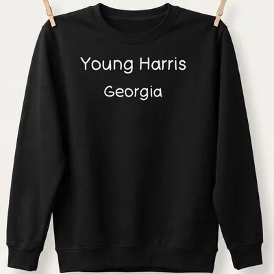 Typography design of Young Harris, Georgia in black and white text — printed on a unisex sweatshirt